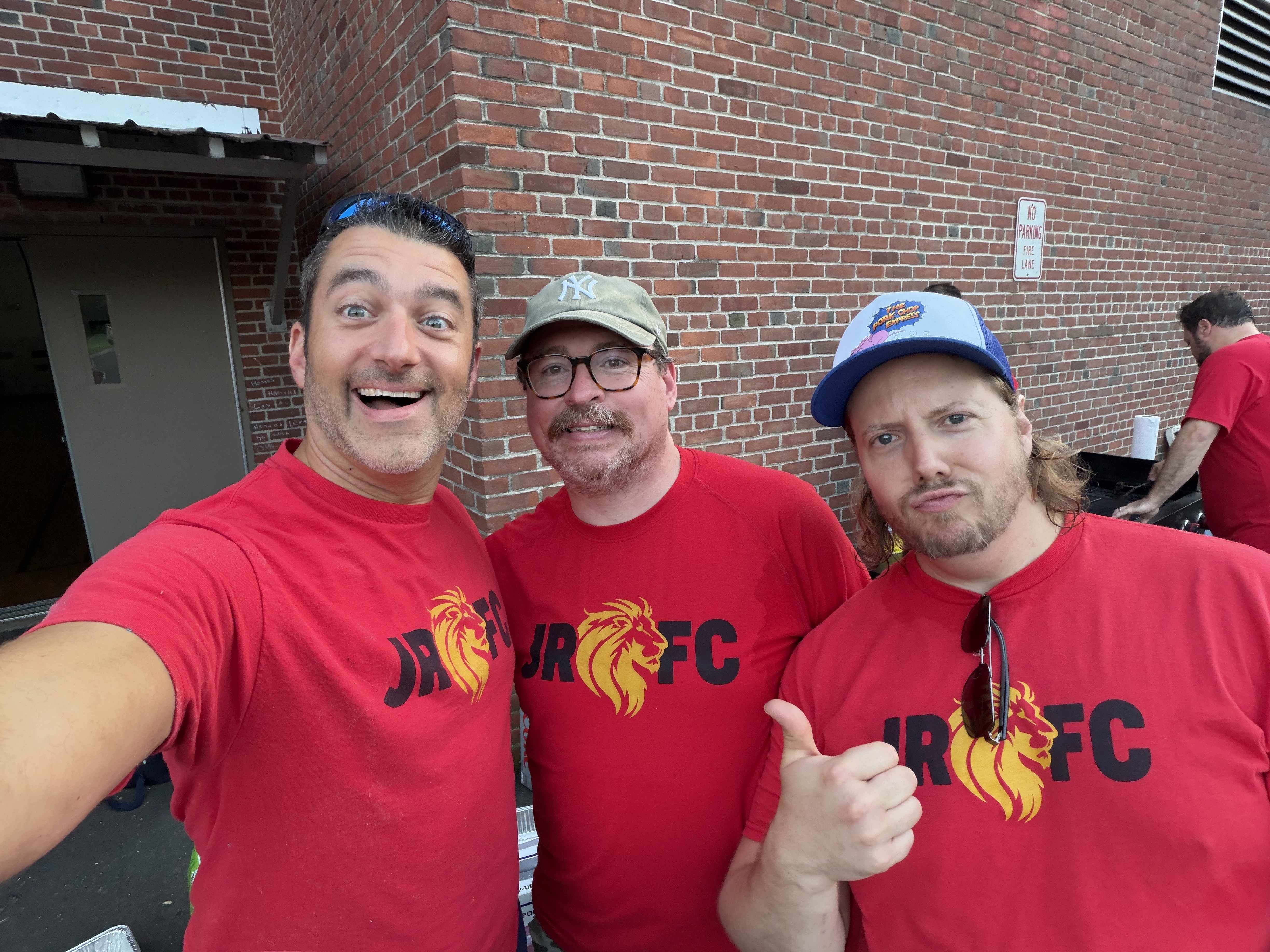 Three Fathers Club members gathered at the Back to School BBQ